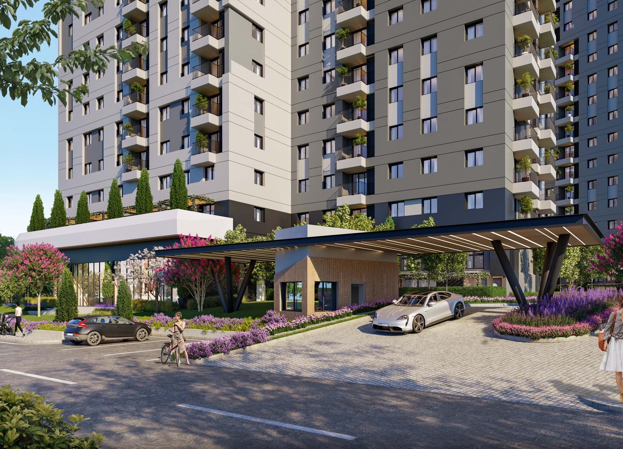 Main vehicle entrance to the development, with a long slatted canopy over a paved drop-off, timber-clad gatehouse and lavender beds, below the grey and cream balconied facades — artist's impression