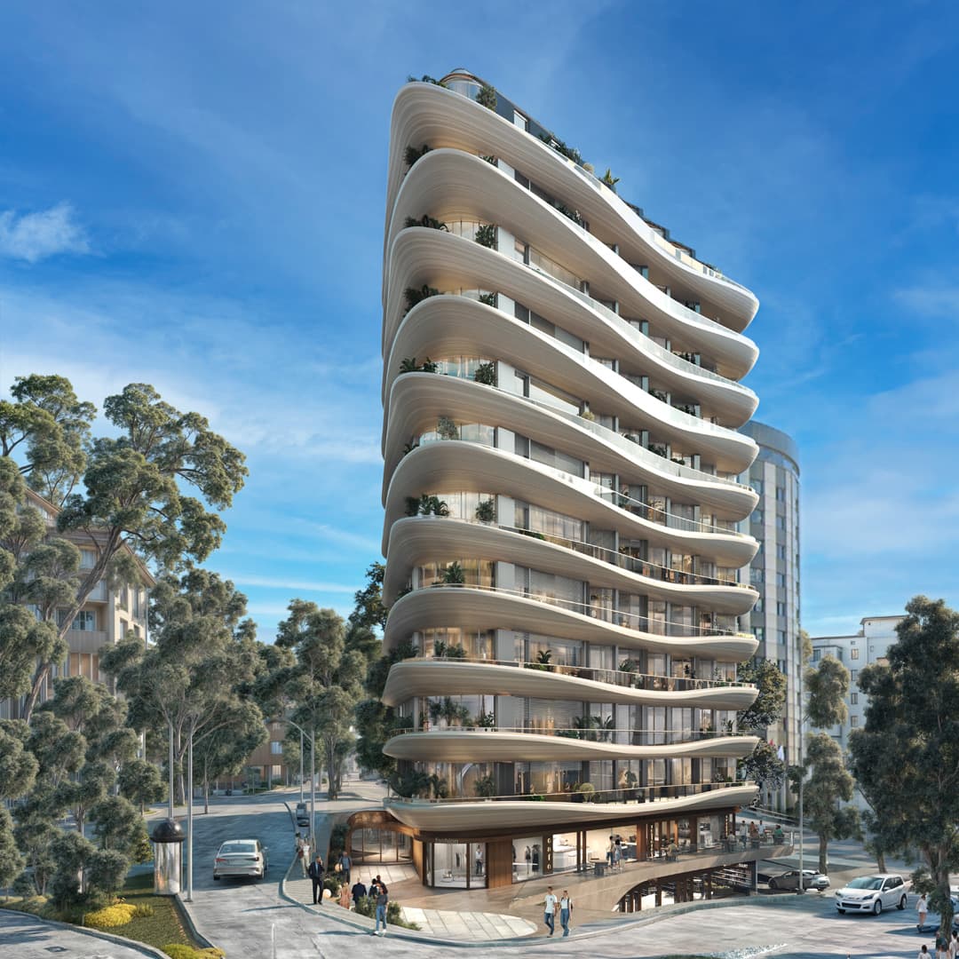 Babacan Meridian بين أشجار معمّرة في شارعه بحي Gayrettepe في Beşiktaş، مع مبانٍ سكنية مجاورة وبرج منحنٍ إلى جانبه