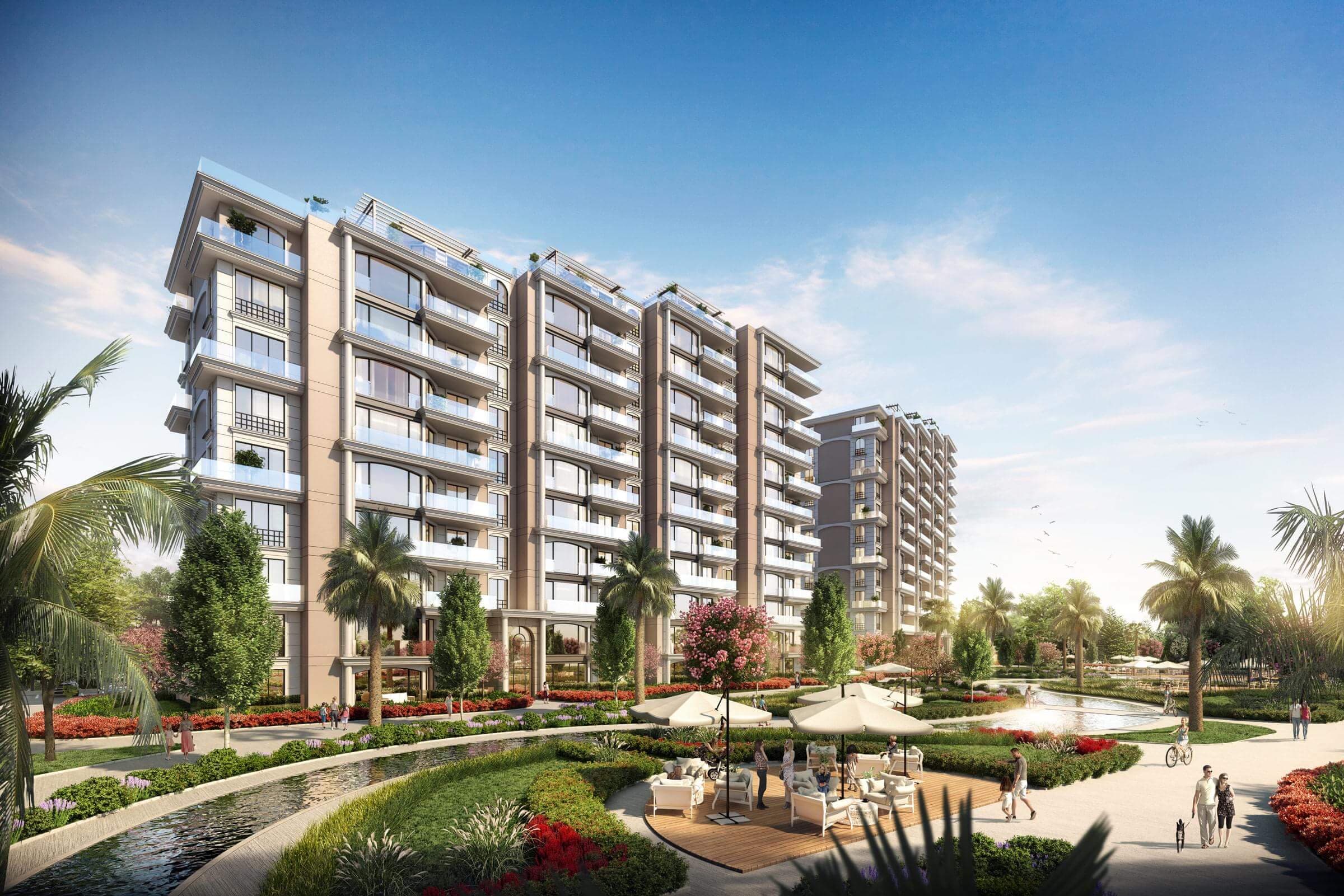 Deniz İstanbul'da Marina Rezidans'ın mimari görselleştirmesi: peyzajlı bir avlunun çevresinde kademelenen balkonlu bloklar, budanmış bitkilendirme arasından geçen su kanalı ve çime yerleştirilmiş şemsiyeler ile oturma grupları.