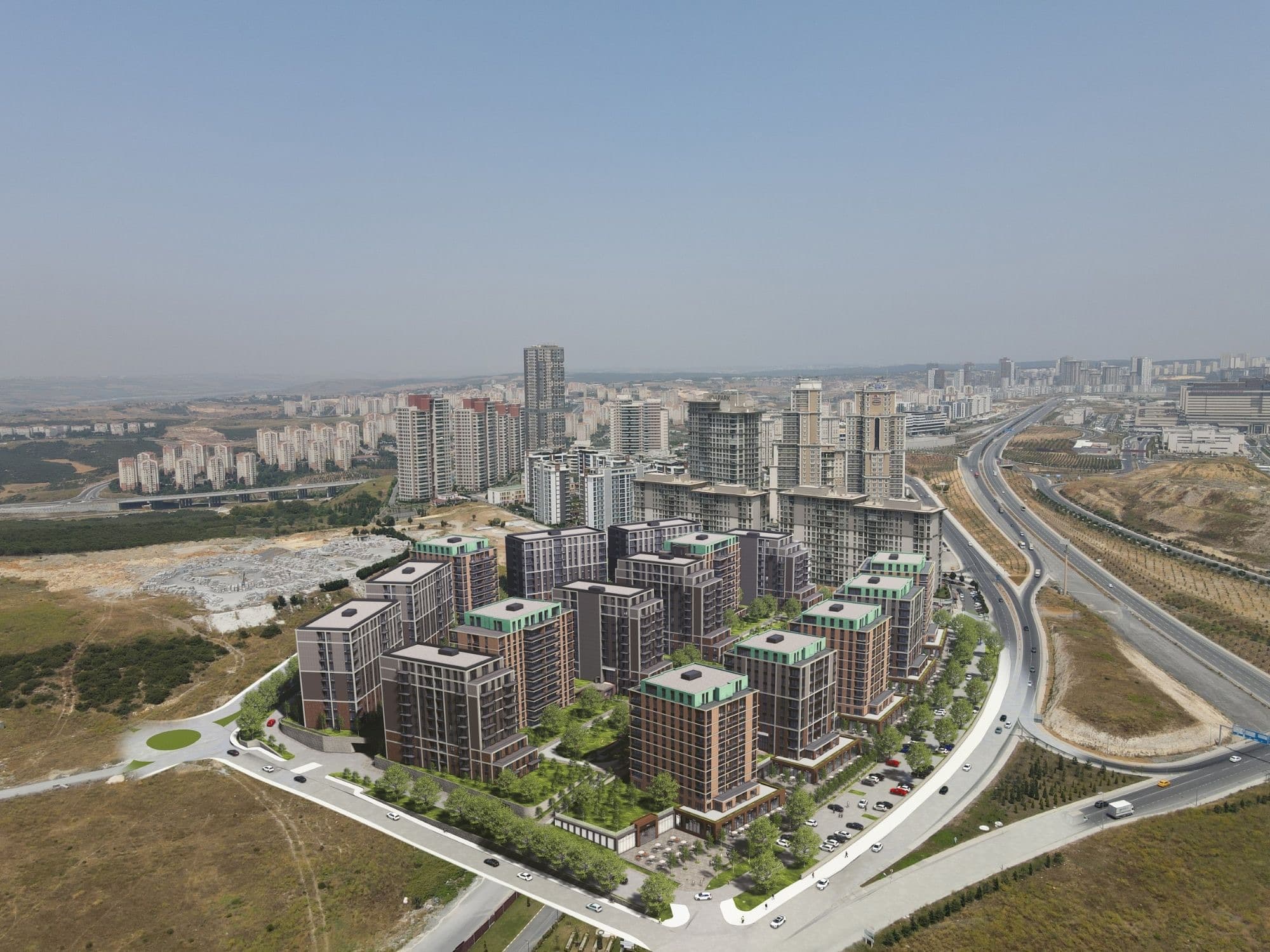 Render of the completed Ebruli Başakşehir placed into an aerial photograph of the district: the sixteen blocks laid out on their plateau with the motorway curving past them and the Başakşehir skyline stretching to the horizon