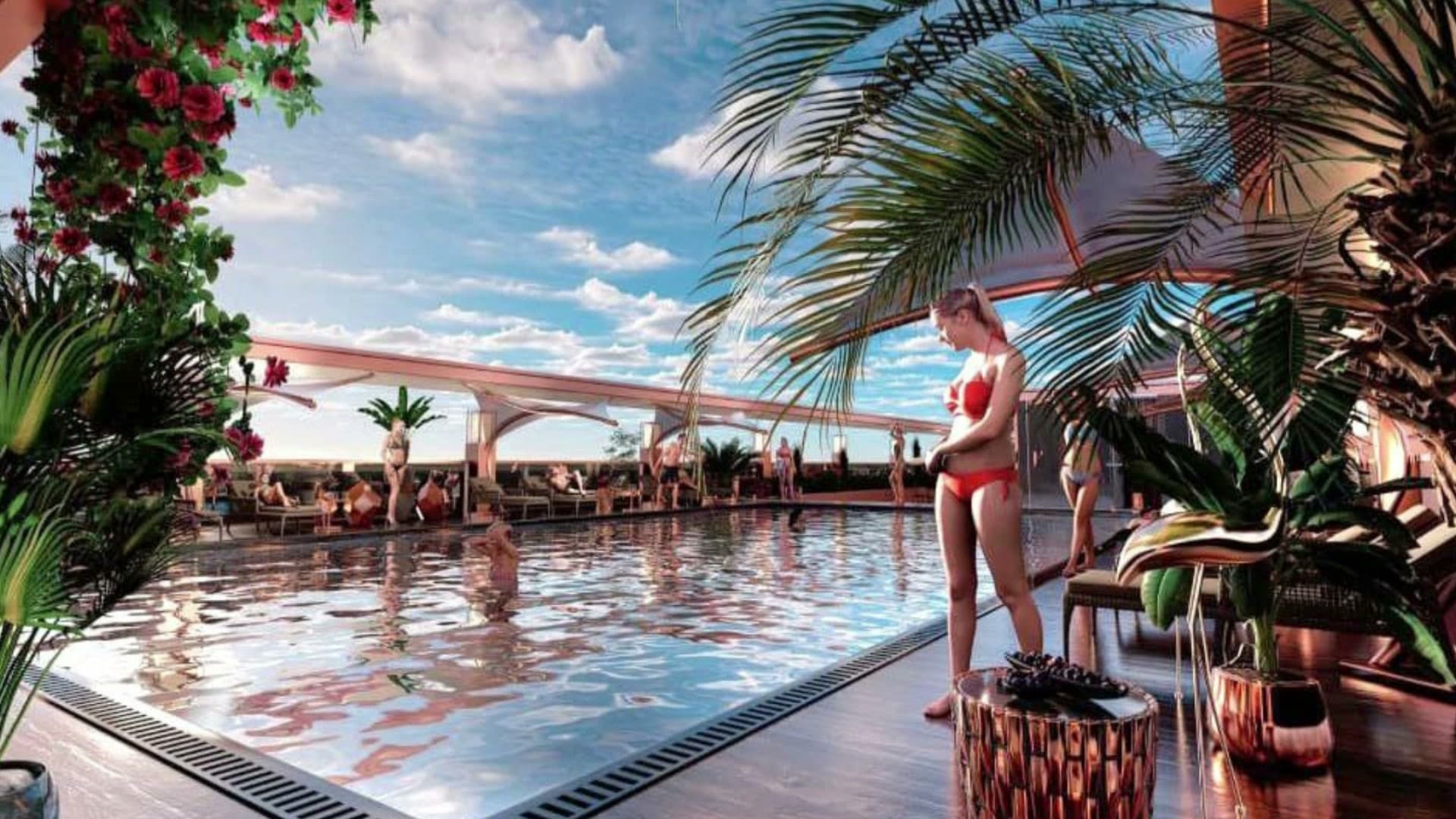 صورة تخيلية لمسبح طابق السطح في Empire Paradise من خلف سعف النخيل وزهور حمراء متدلية، وكراسي استلقاء ومظلة ظل وسابحون على الأرضية الخشبية تحت سماء ساطعة بغيومها