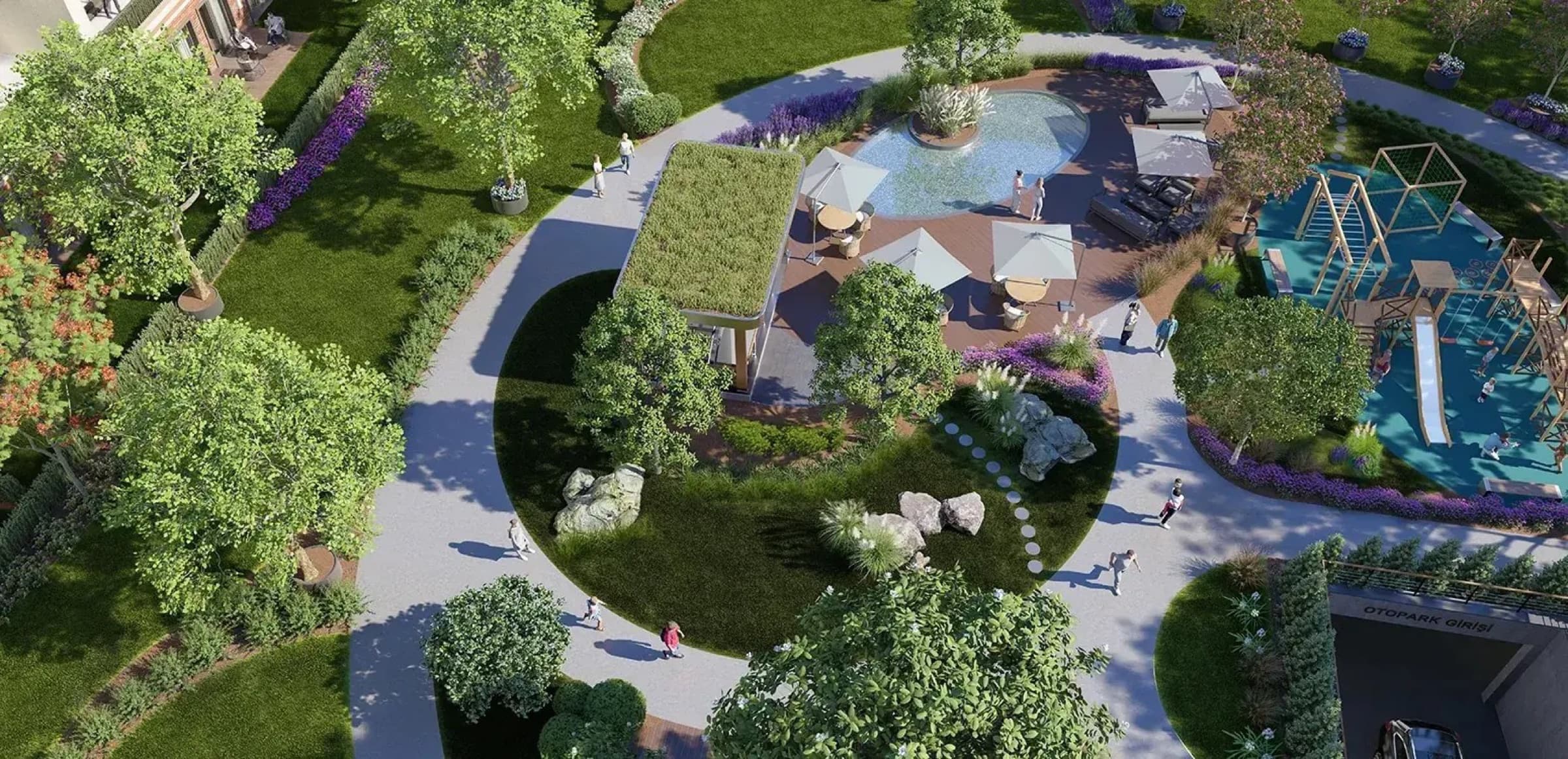 Özak Duyu Göktürk from above, the outdoor swimming pool, a green-roofed pavilion and the children's play area set among winding paths and planting, Eyüpsultan