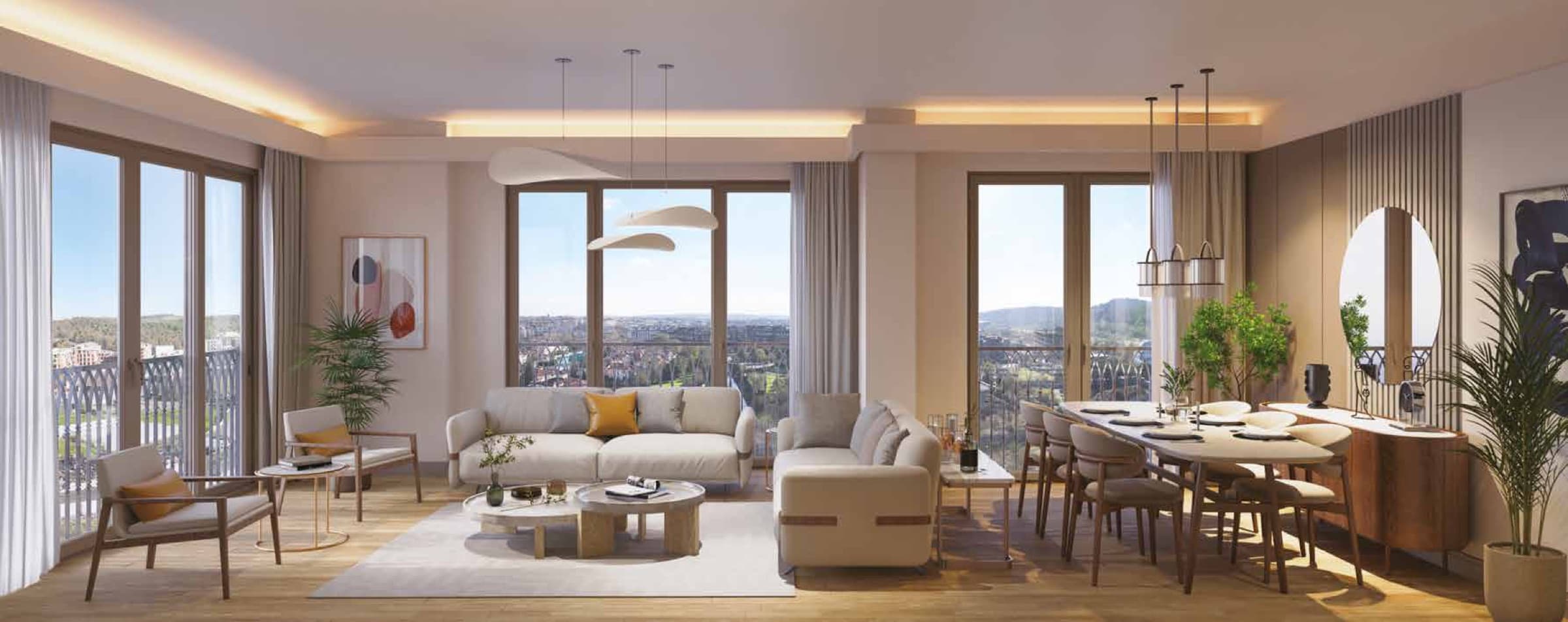 Özak Duyu Göktürk apartment interior, an open-plan living and dining room opening through full-height doors to balconies with arched railings and a view to the wooded hills
