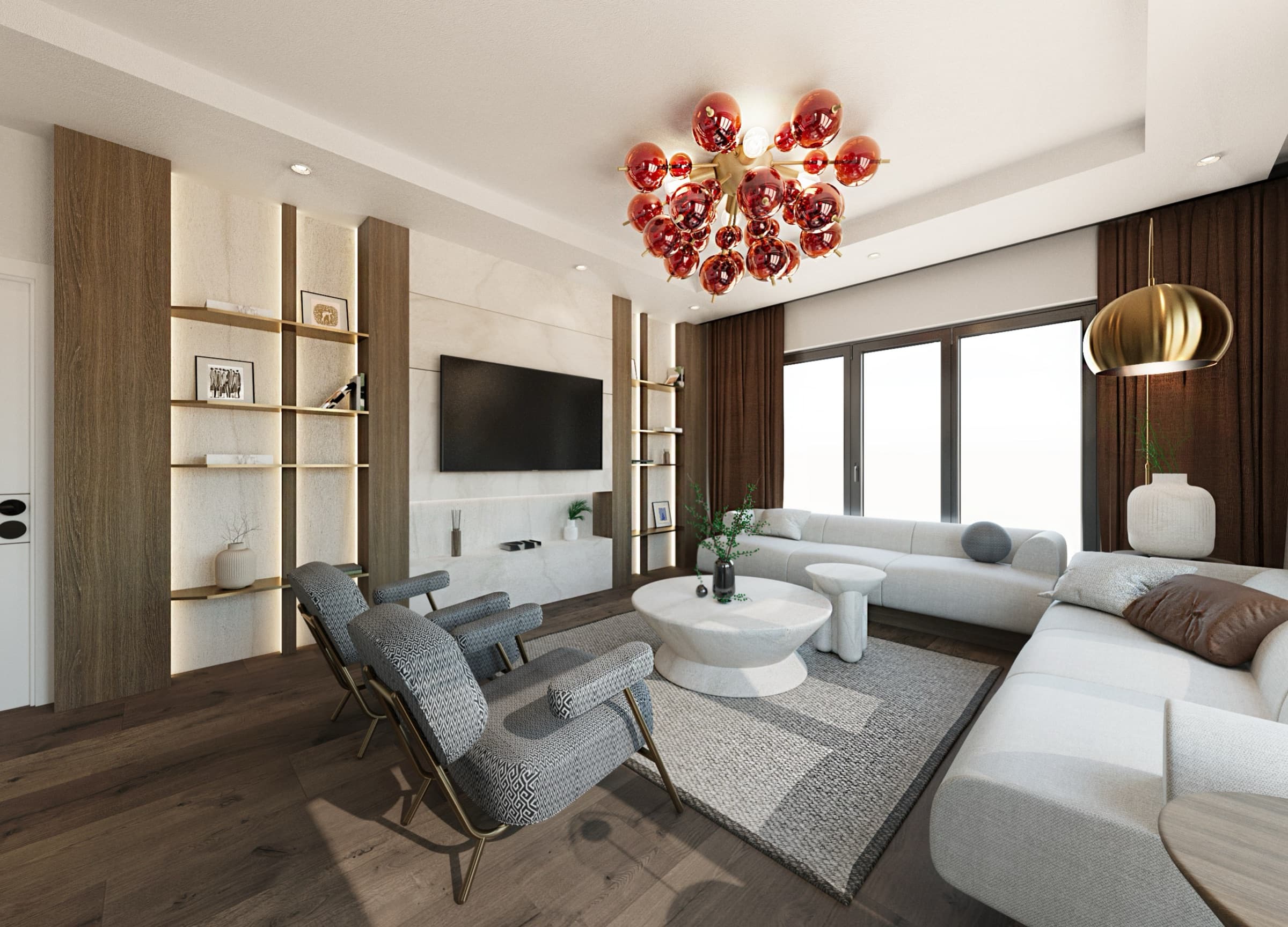 The living room of a 3+1 apartment at Venara Güneşli: two patterned armchairs and a long sofa set around a round stone table, walnut and backlit stone shelving along one wall, and a red glass chandelier under the coffered ceiling.